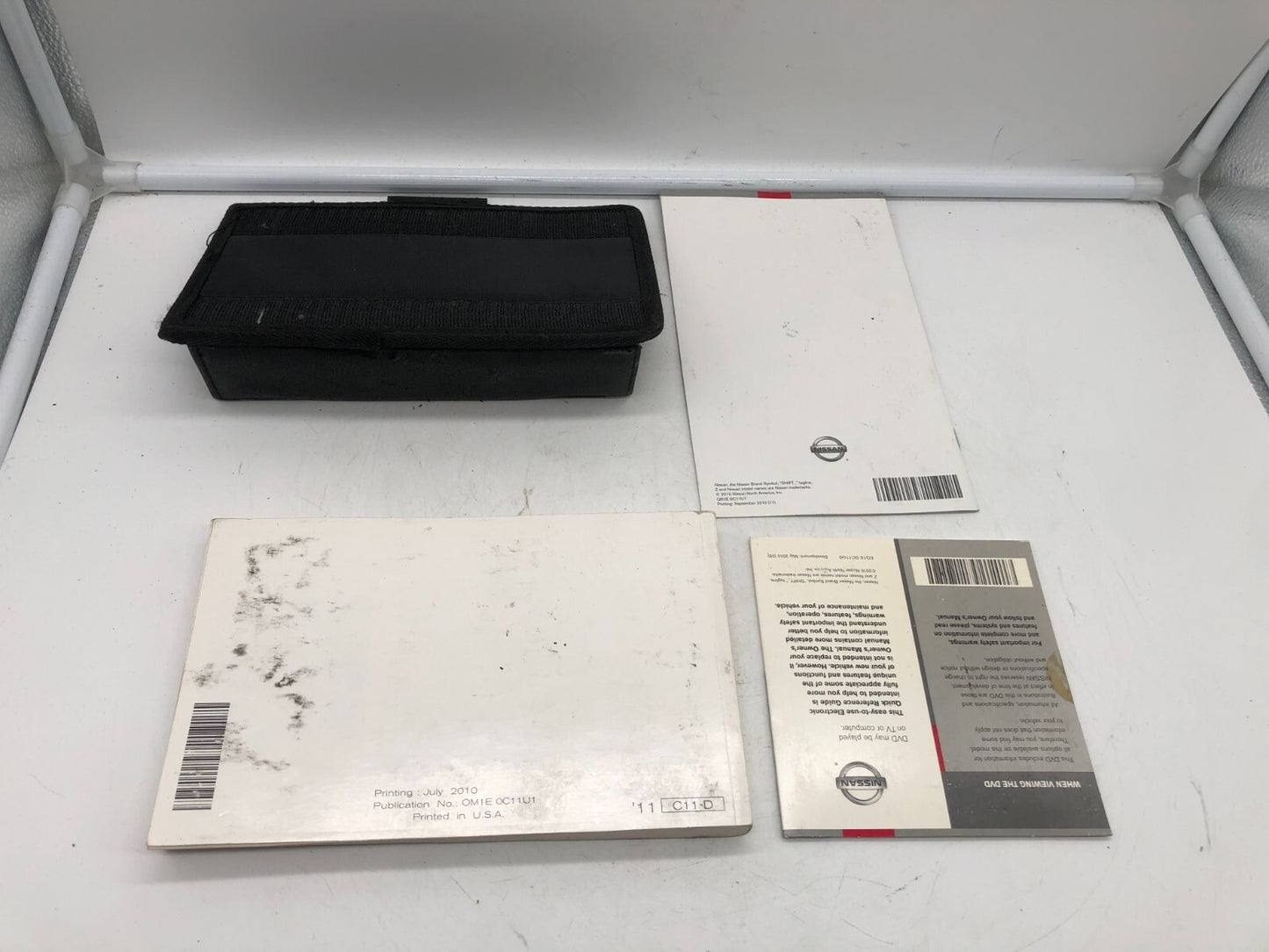 2011 Nissan Versa Owners Manual Set with Case OEM E02B40062