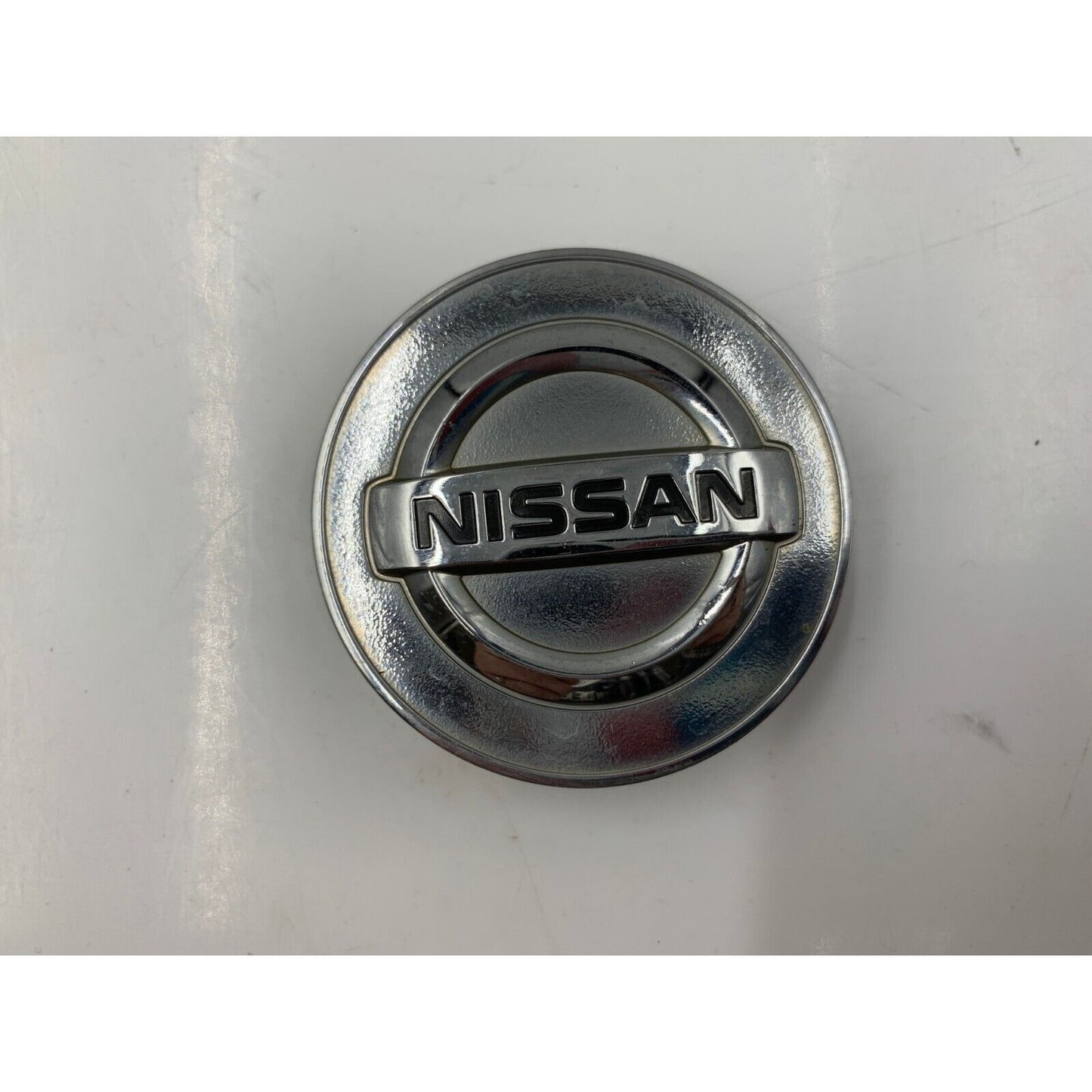 Nissan Rim Wheel Center Cap Chrome OEM E04B17090