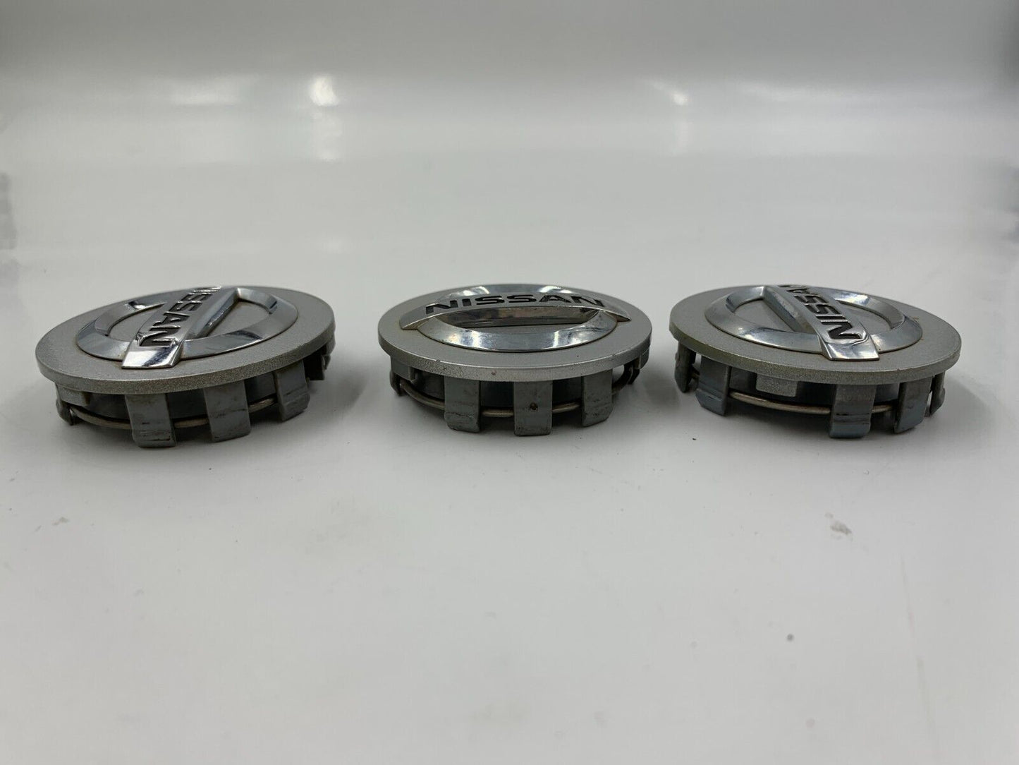 Nissan Rim Wheel Center Cap Set Chrome OEM H01B34031