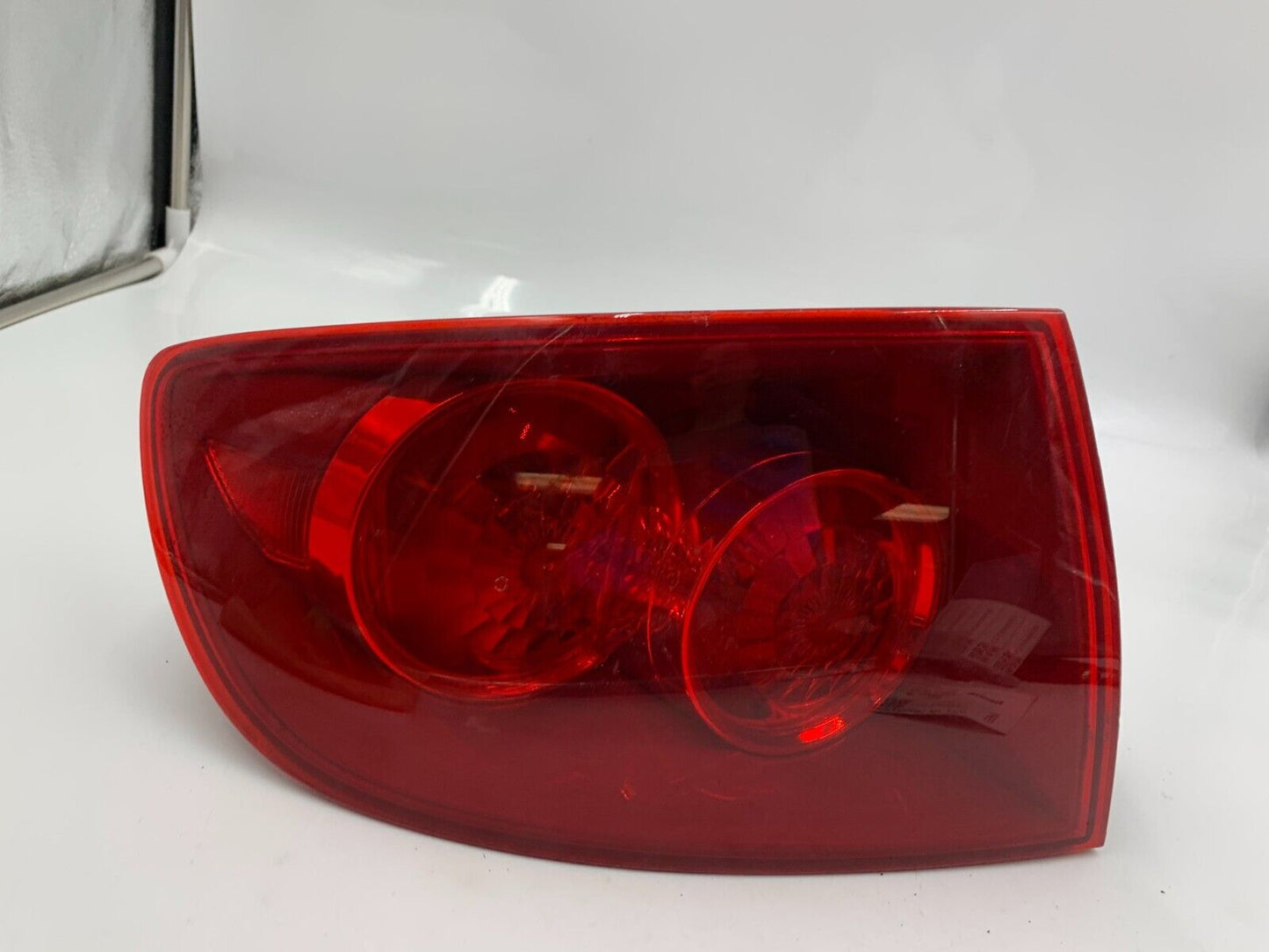 2004-2006 Mazda 3 Driver Side Tail Light Taillight OEM C01B46025