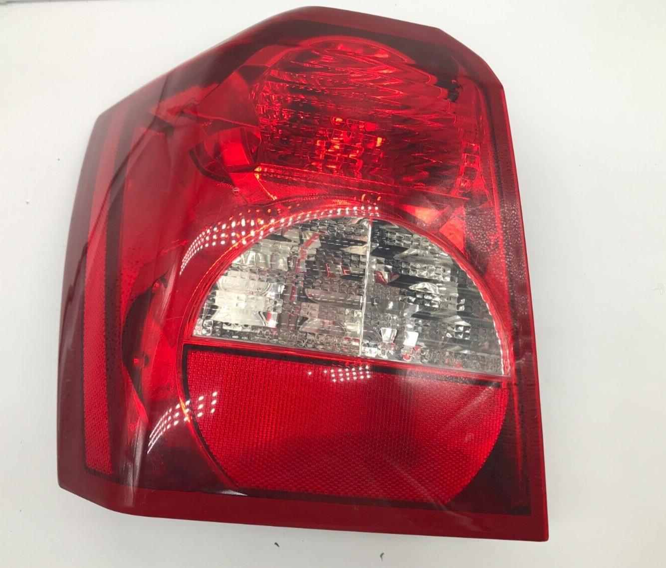 2008-2012 Dodge Caliber Driver Side Tail Light Taillight OEM E03B29041