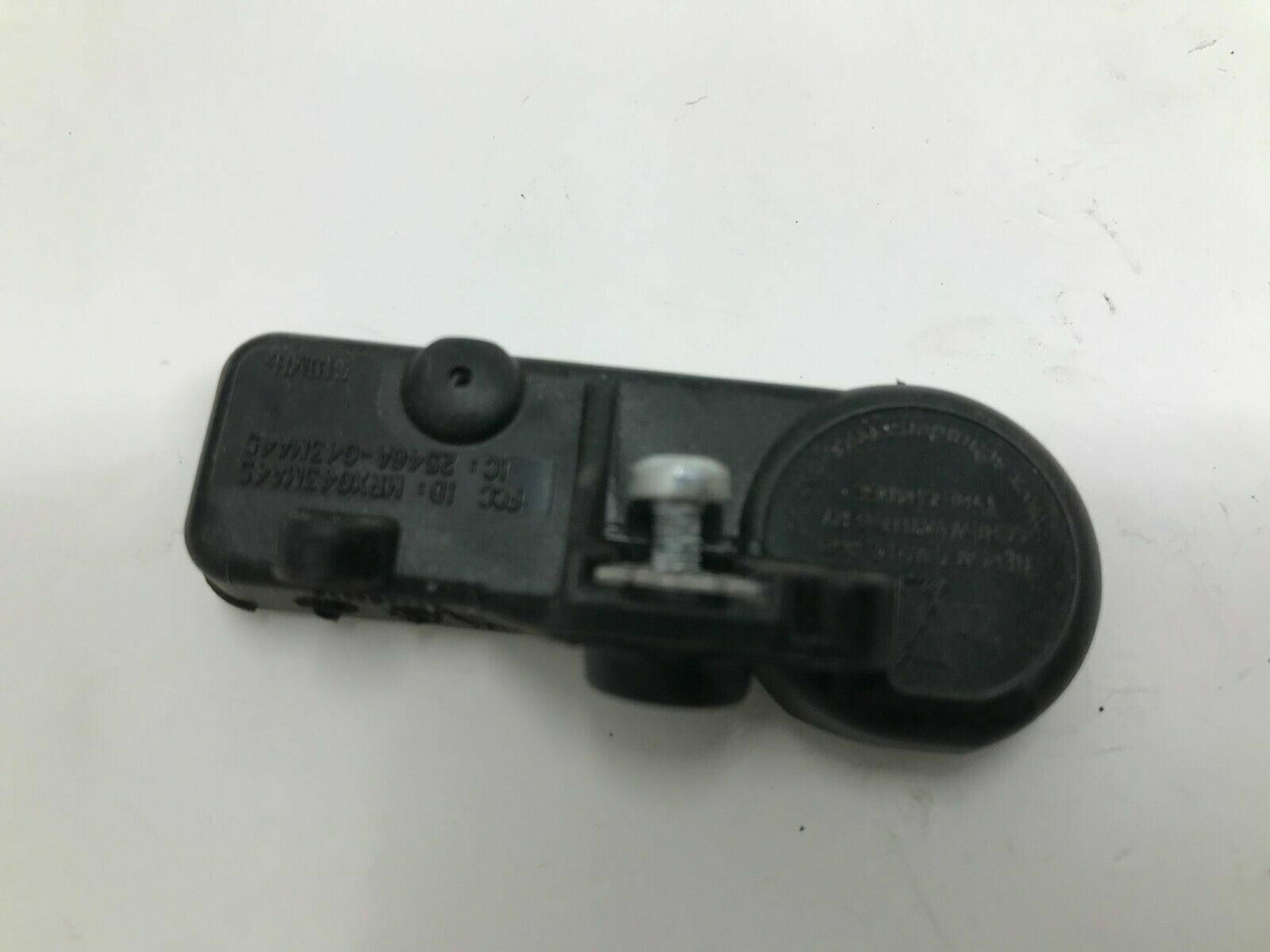 2009 Chevrolet Avalanche 1500 TPMS Sensor Tire Pressure Sensor Genuine E02B02002