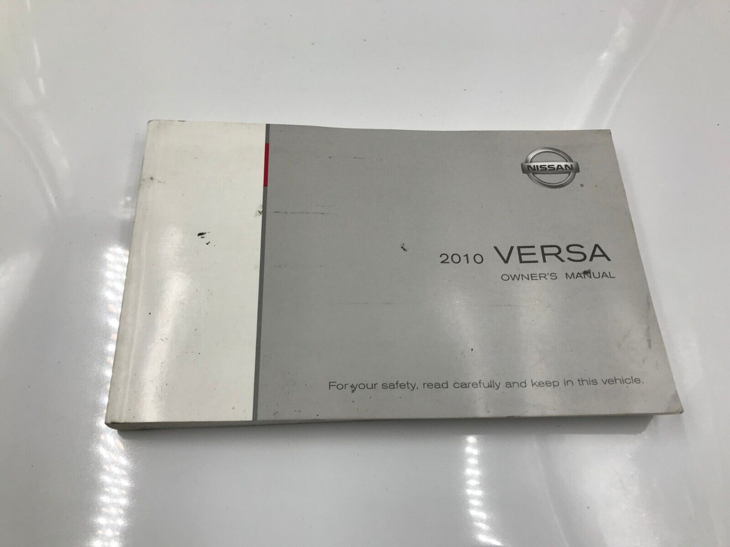 2010 Nissan Versa Owners Manual Handbook Set with Case OEM G02B48037