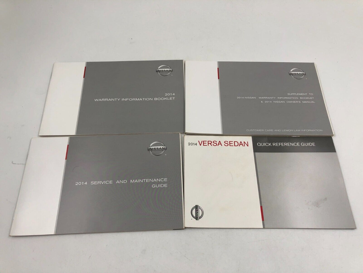 2014 Nissan Versa Sedan Owners Manual Set with Case OEM B04B55037