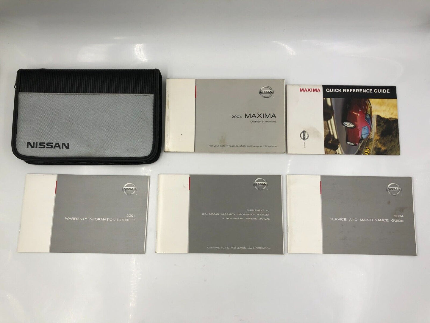 2004 Nissan Maxima Owners Manual Handbook Set with Case OEM I02B17022