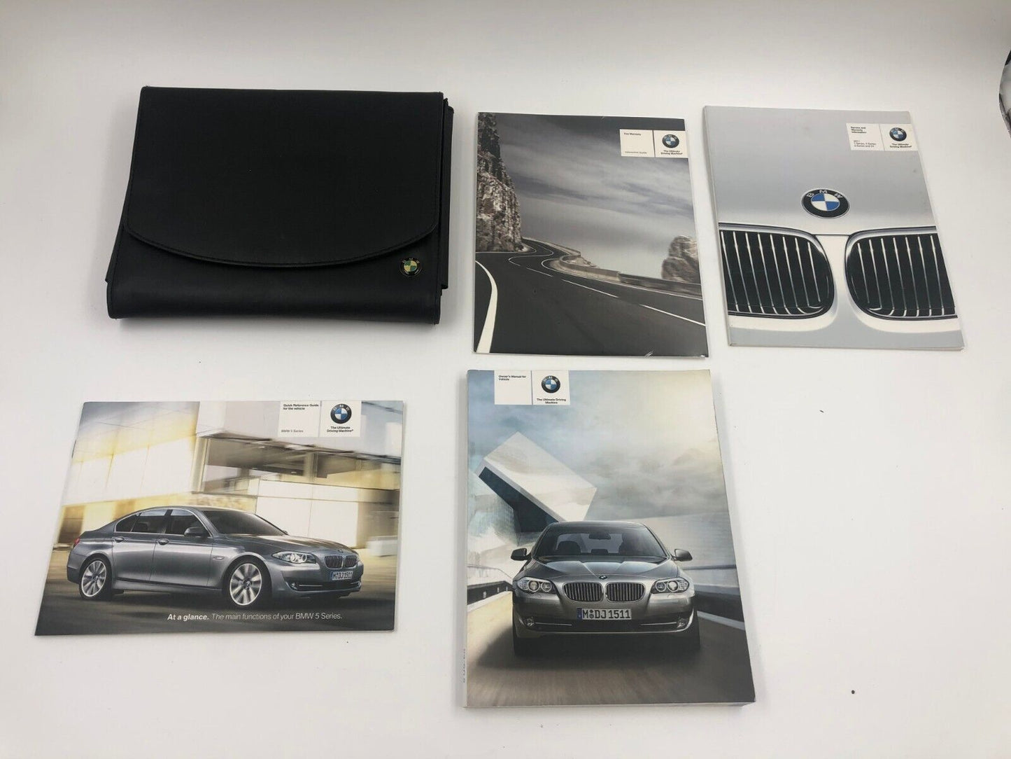 2011 BMW 528i 535i 550i Sedan Owners Manual Set with Case A01B11026