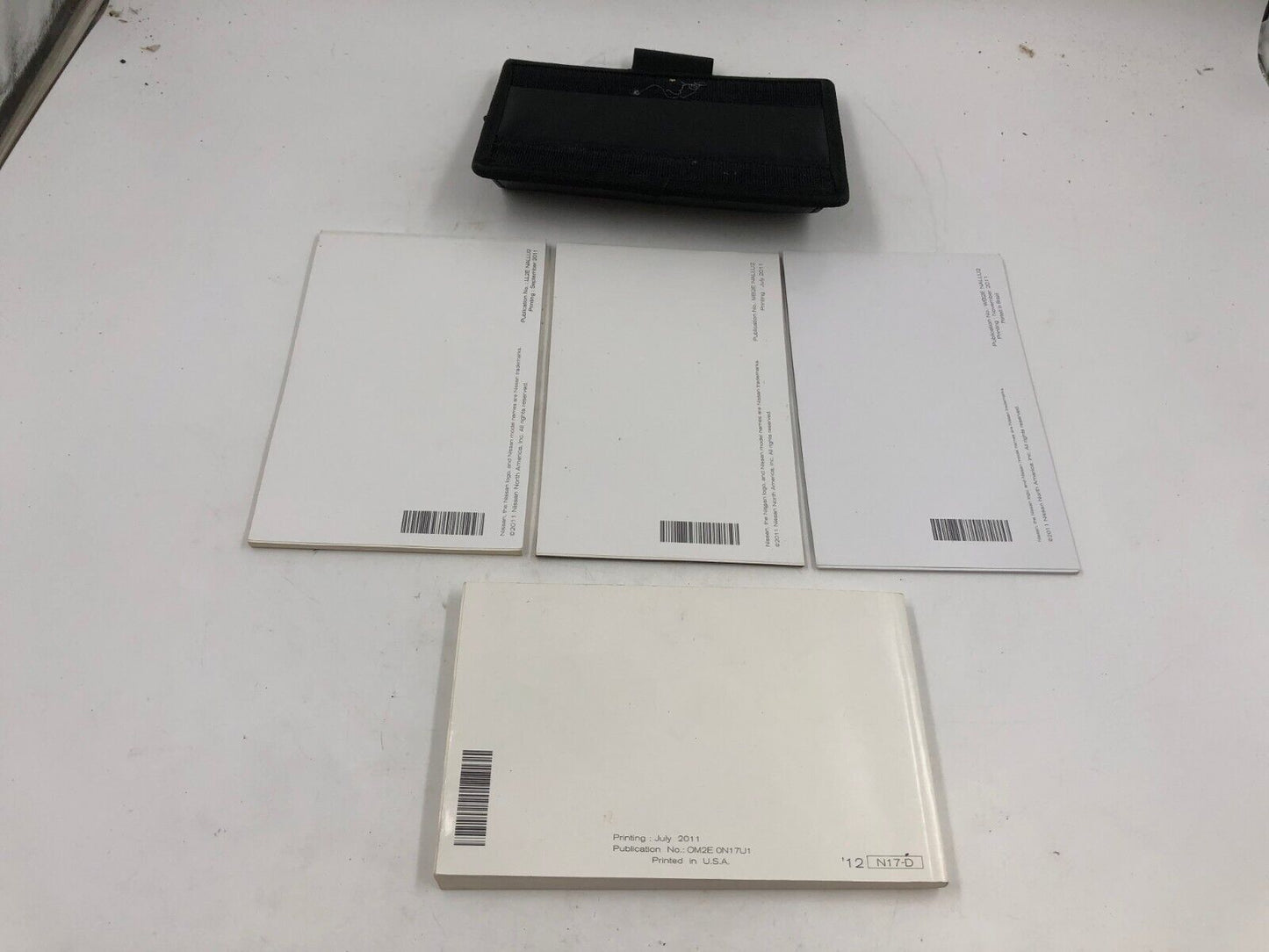 2012 Nissan Versa Sedan Owners Manual Set with Case OEM F01B24057