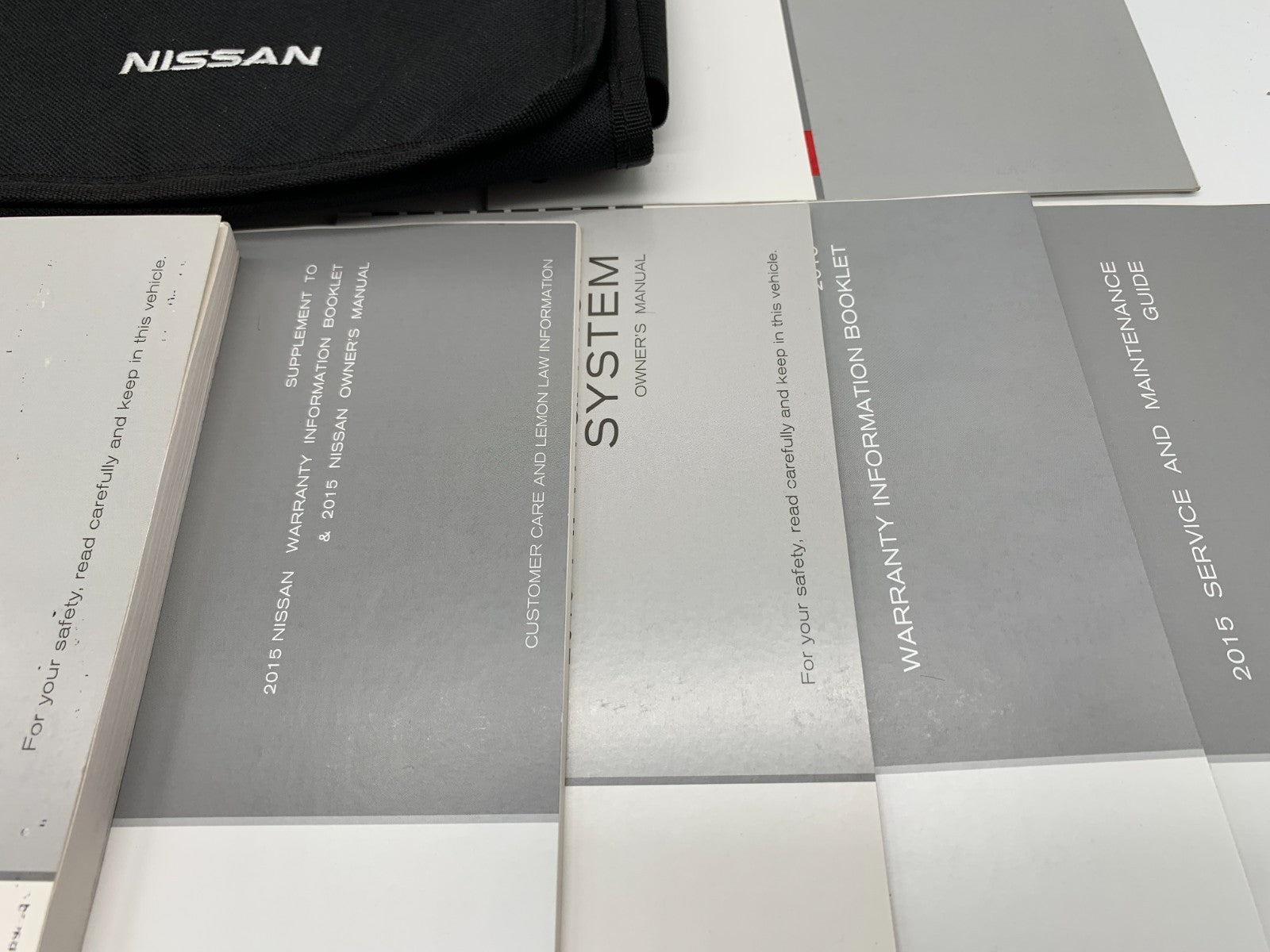 2015 Nissan Rogue Owners Manual Set with Case OEM D03B05023