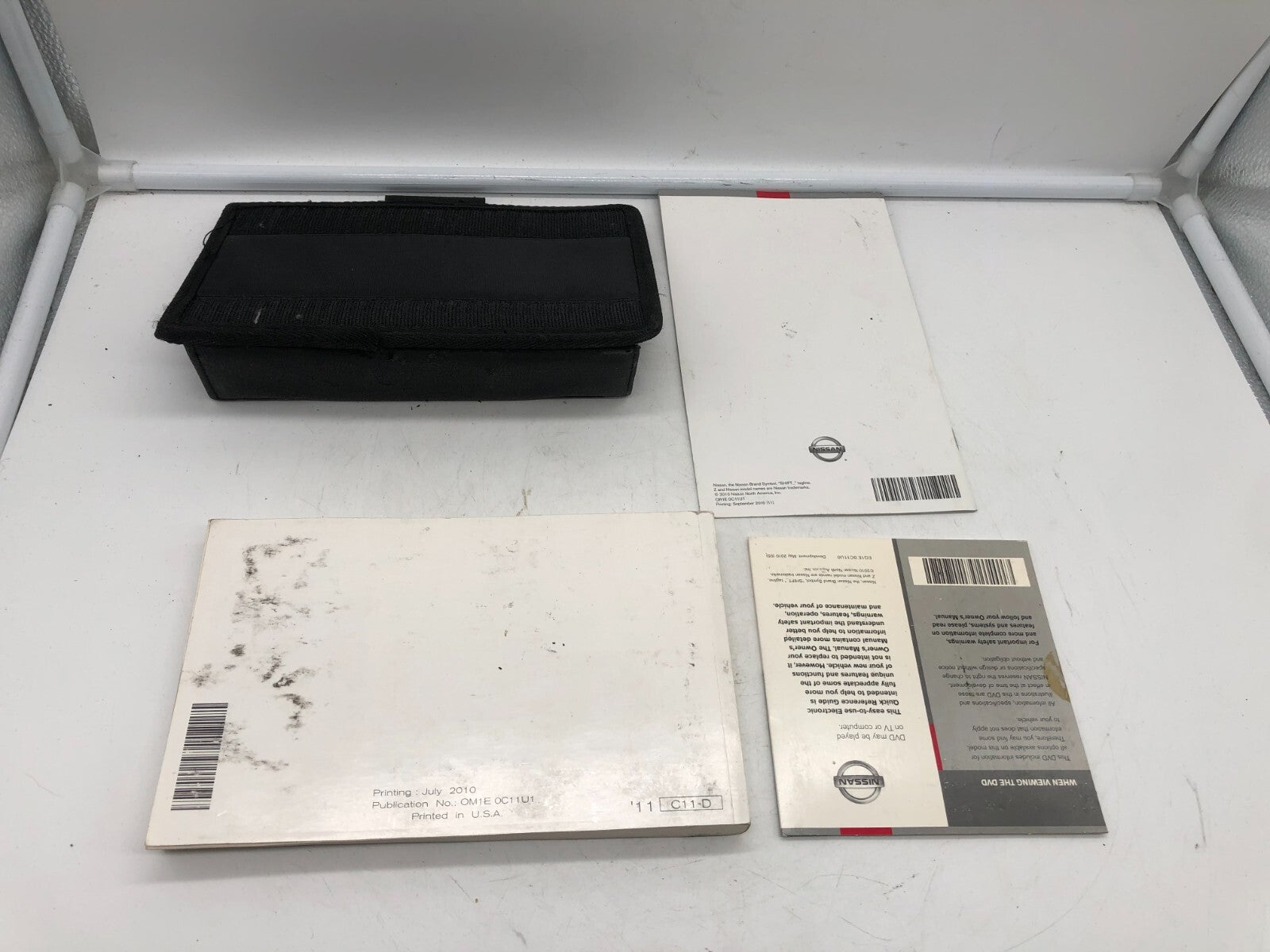 2011 Nissan Versa Owners Manual Set with Case OEM E02B40062