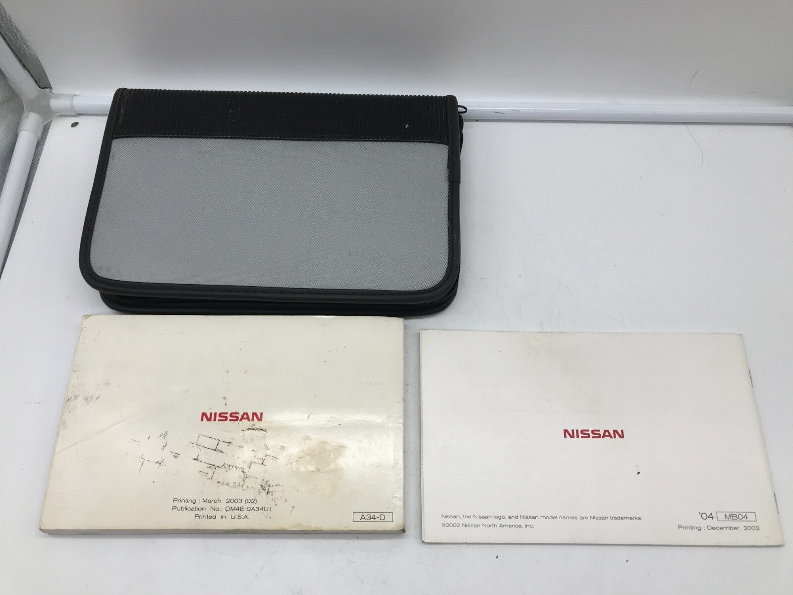 2004 Nissan Maxima Owners Manual Set with Case OEM E02B65003