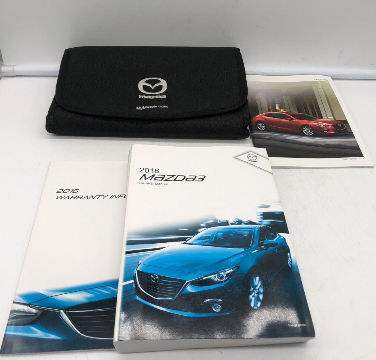 2014 Mazda 3 Owners Manual Set with Case OEM E01B23010