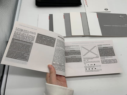 2016 Nissan Rogue Owners Manual Set with Case OEM A03B13006