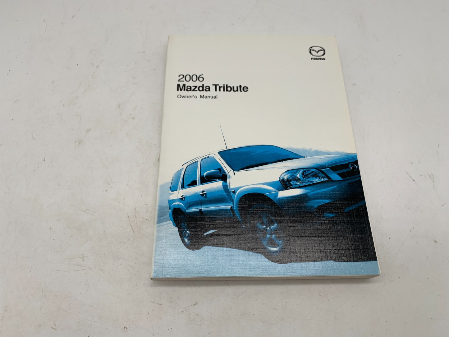 2006 Mazda Tribute Owners Manual Set with Case OEM E01B03061