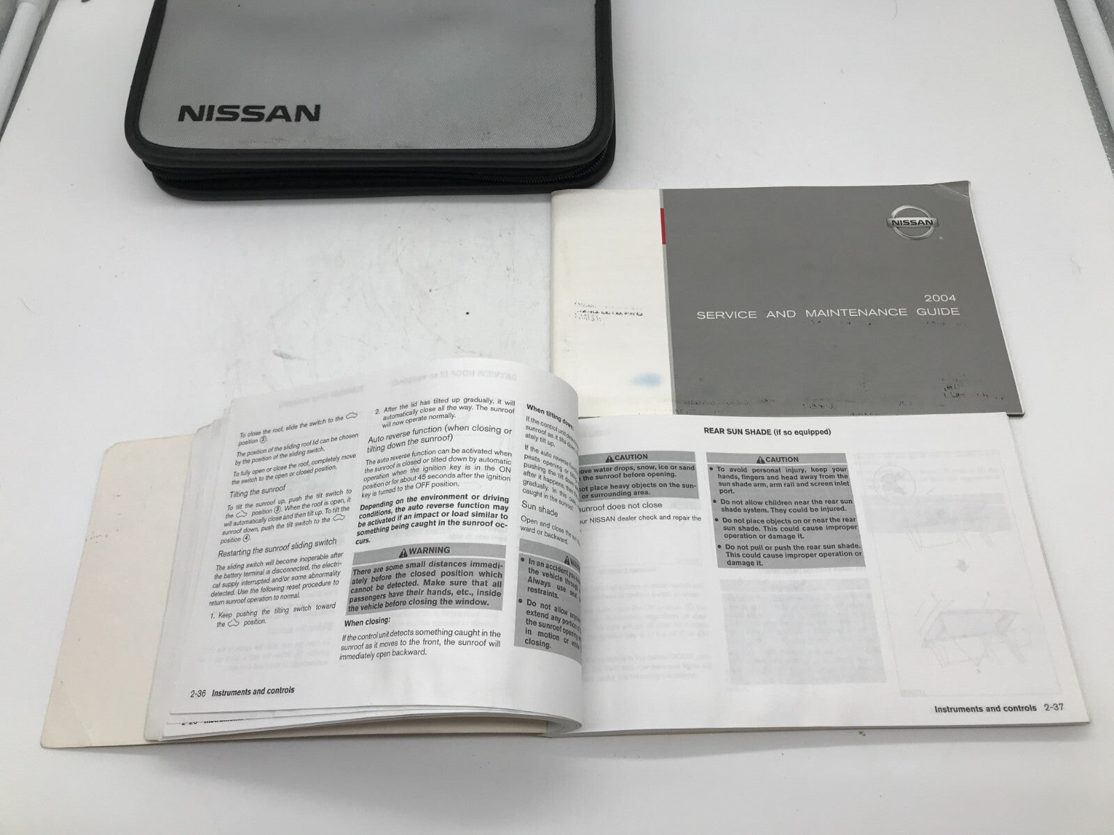 2004 Nissan Maxima Owners Manual Set with Case OEM E02B65003