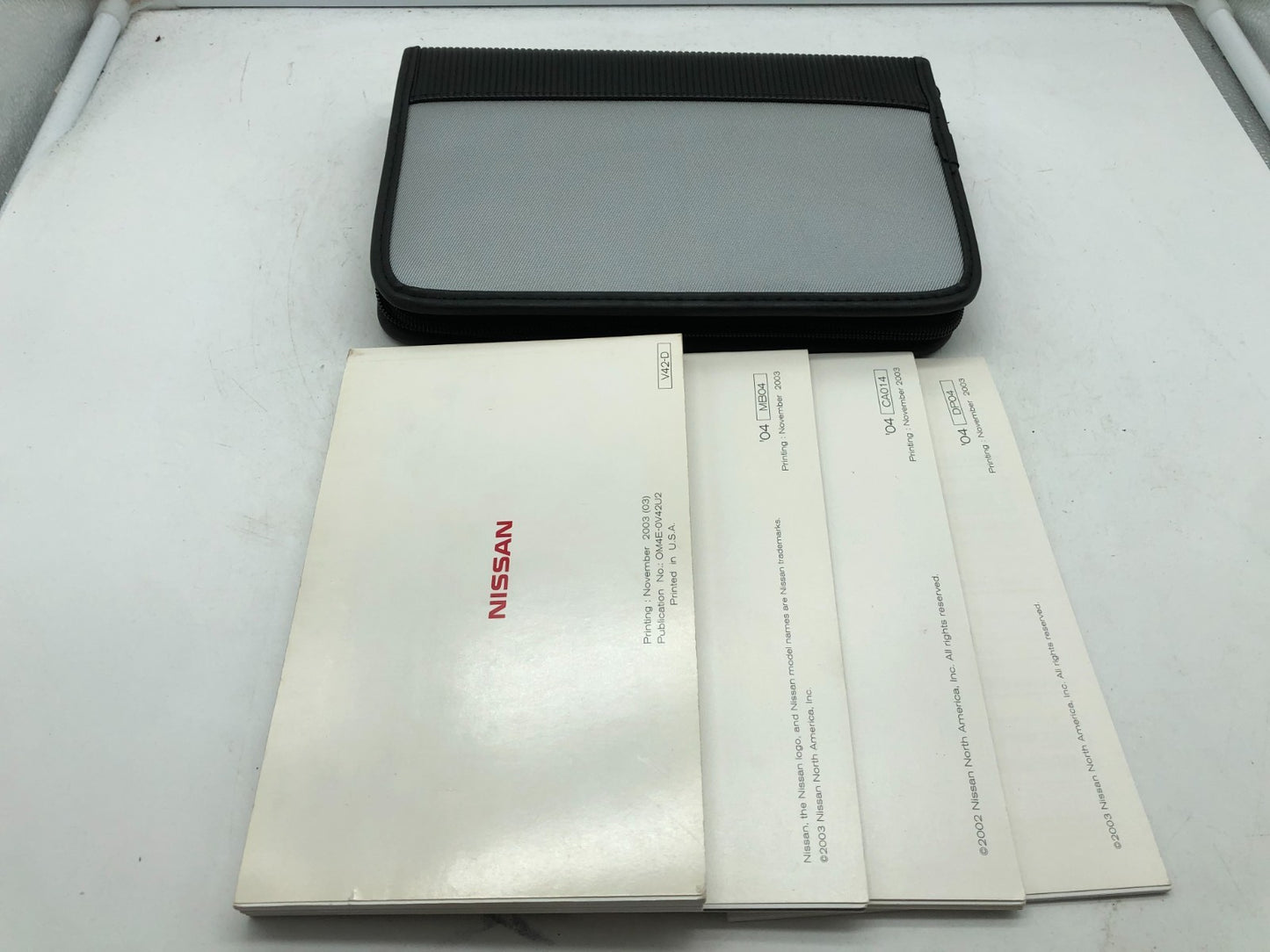 2004 Nissan Quest Owners Manual Set with Case OEM A04B45038
