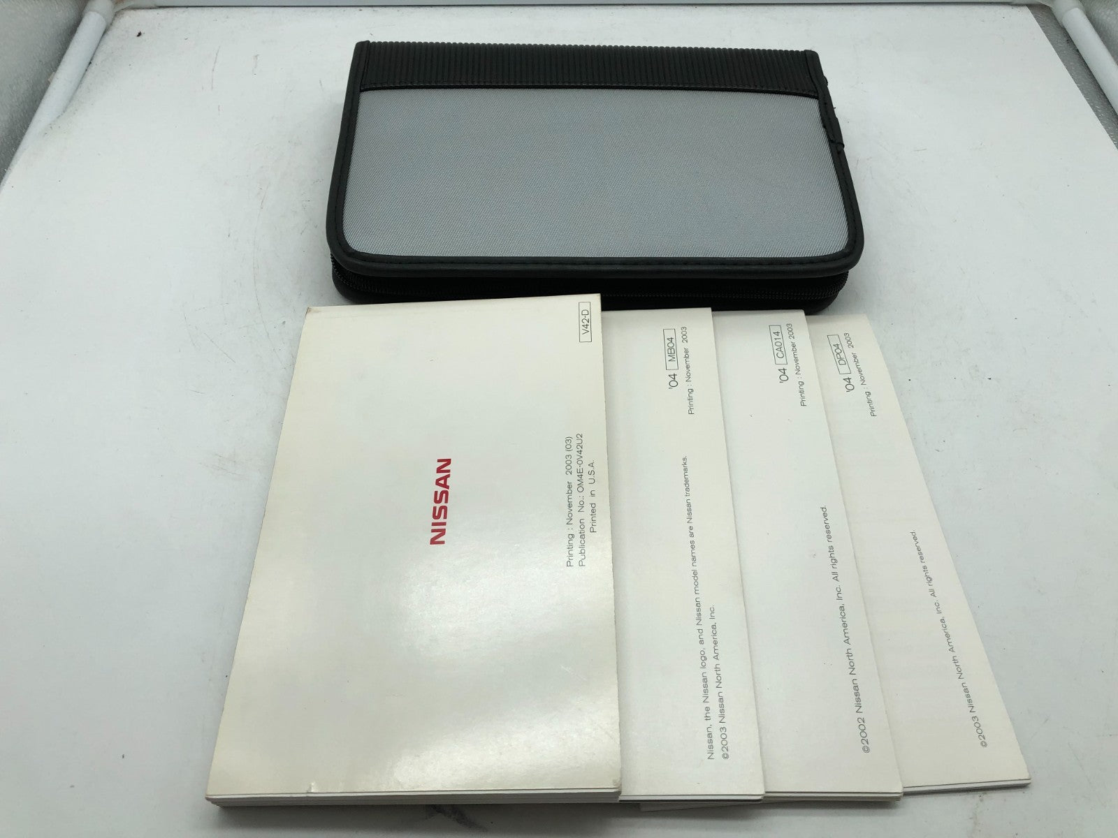 2004 Nissan Quest Owners Manual Set with Case OEM A04B45038