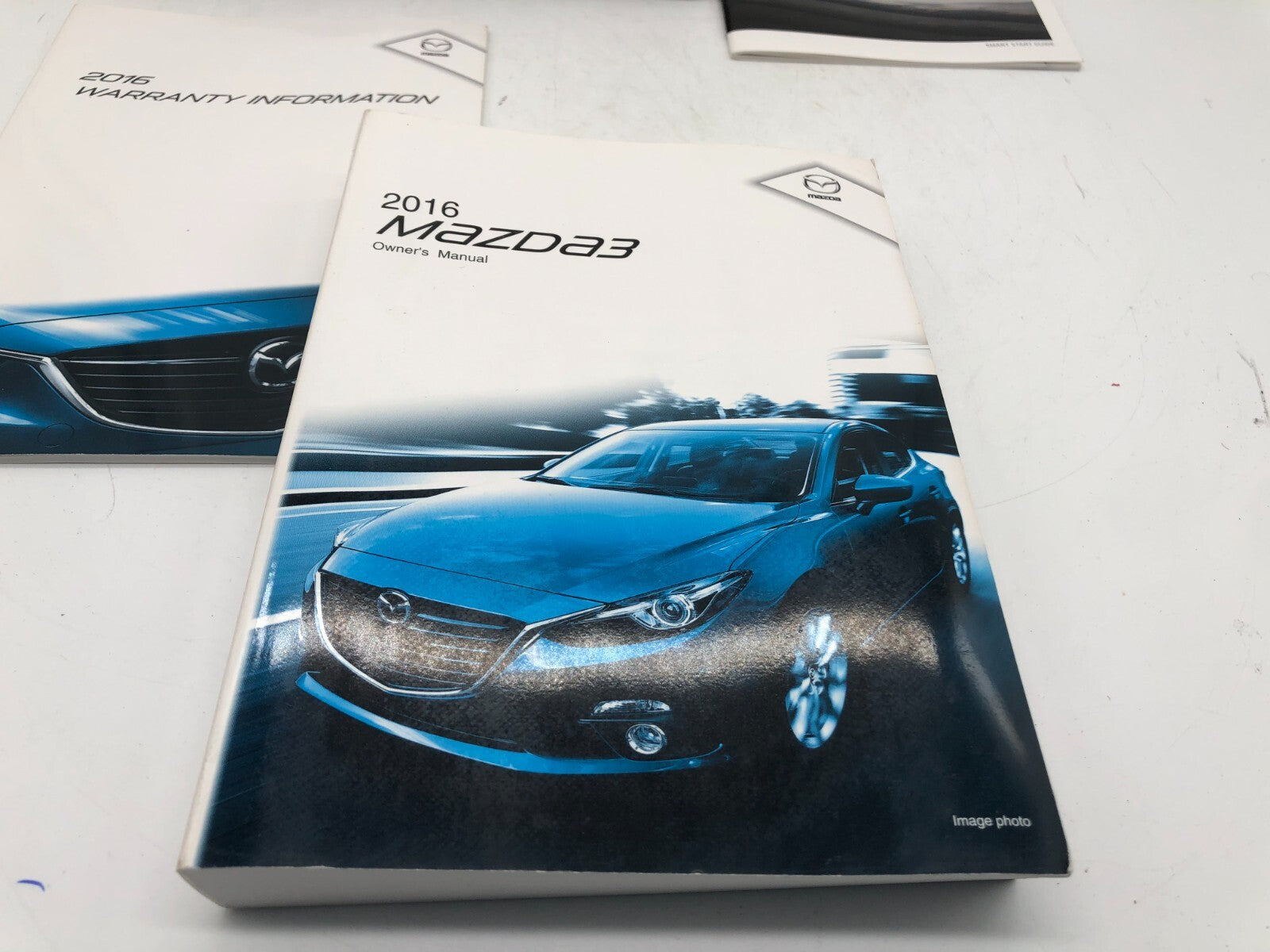 2014 Mazda 3 Owners Manual Set with Case OEM E01B23010