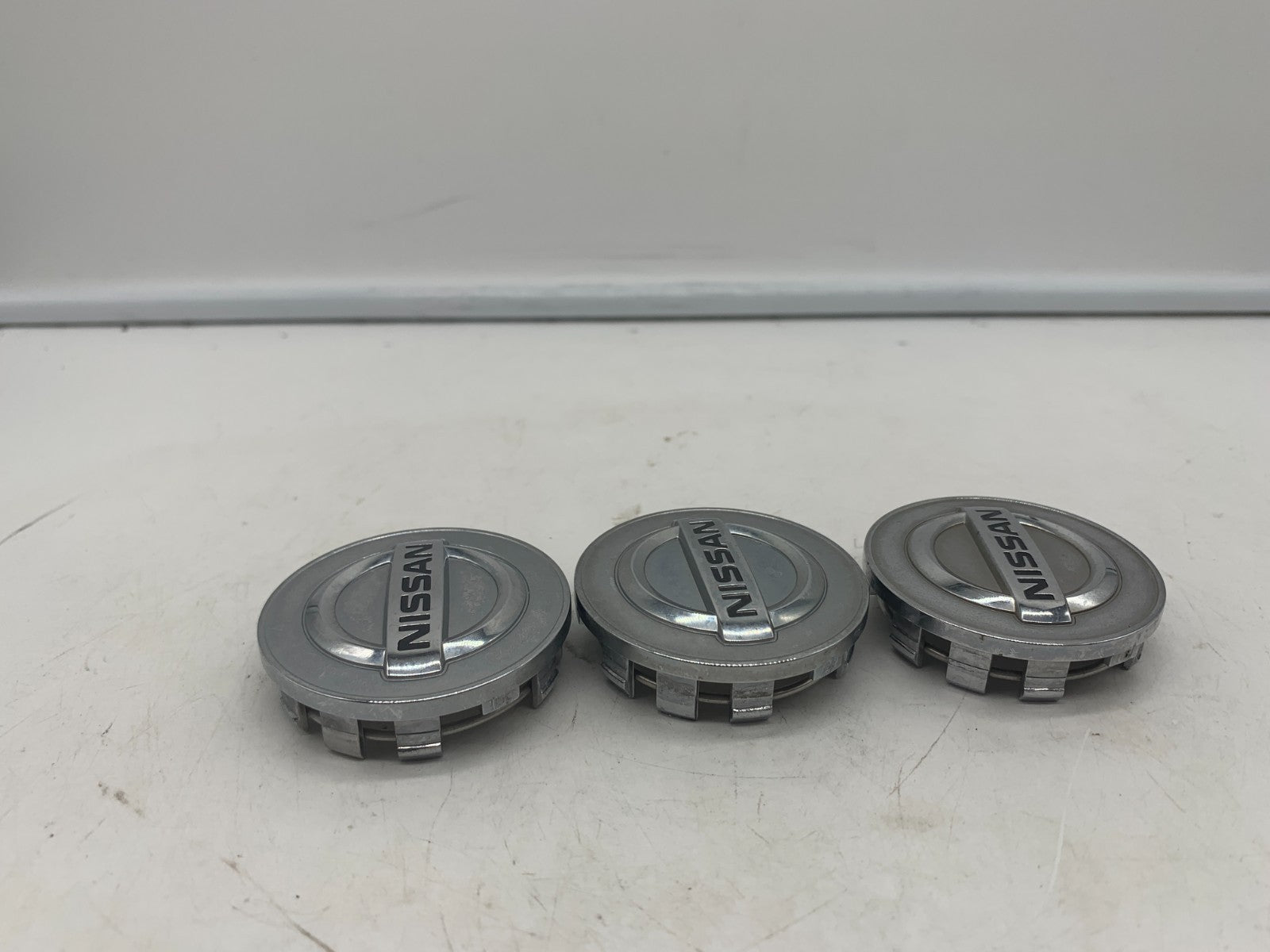 Nissan Rim Wheel Center Cap Chrome 2-inch OEM 40343-2DR0A