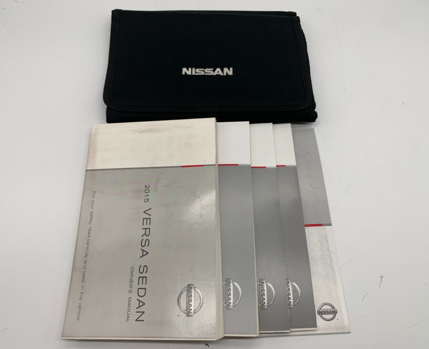 2015 Nissan Versa Sedan Owners Manual Set with Case OEM A02B56004