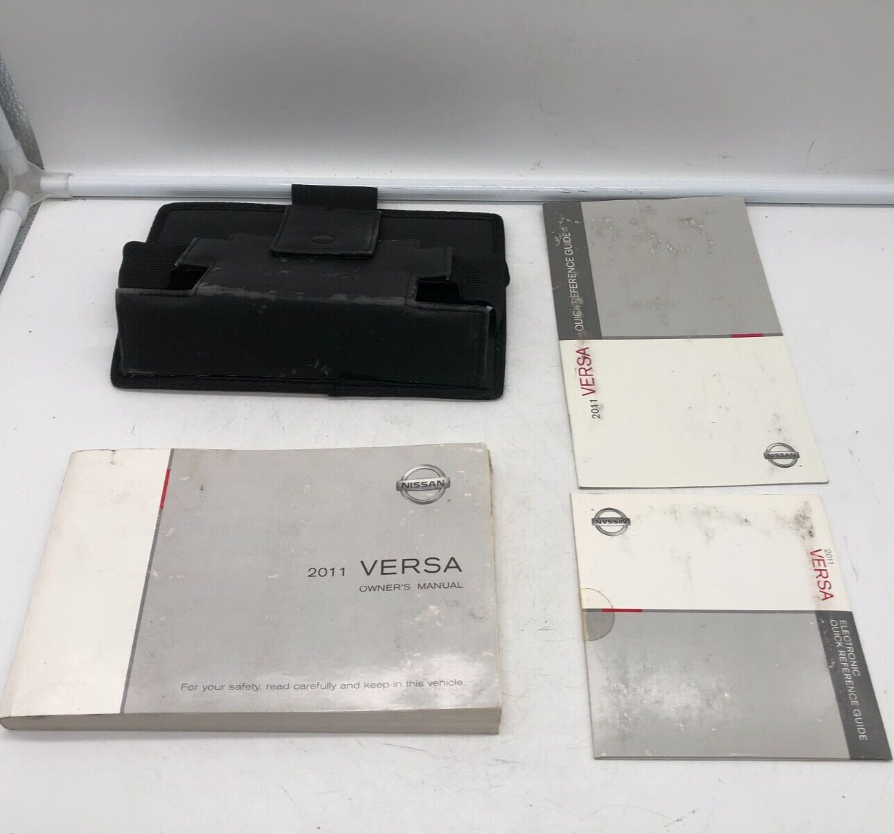 2011 Nissan Versa Owners Manual Set with Case OEM B04B21006
