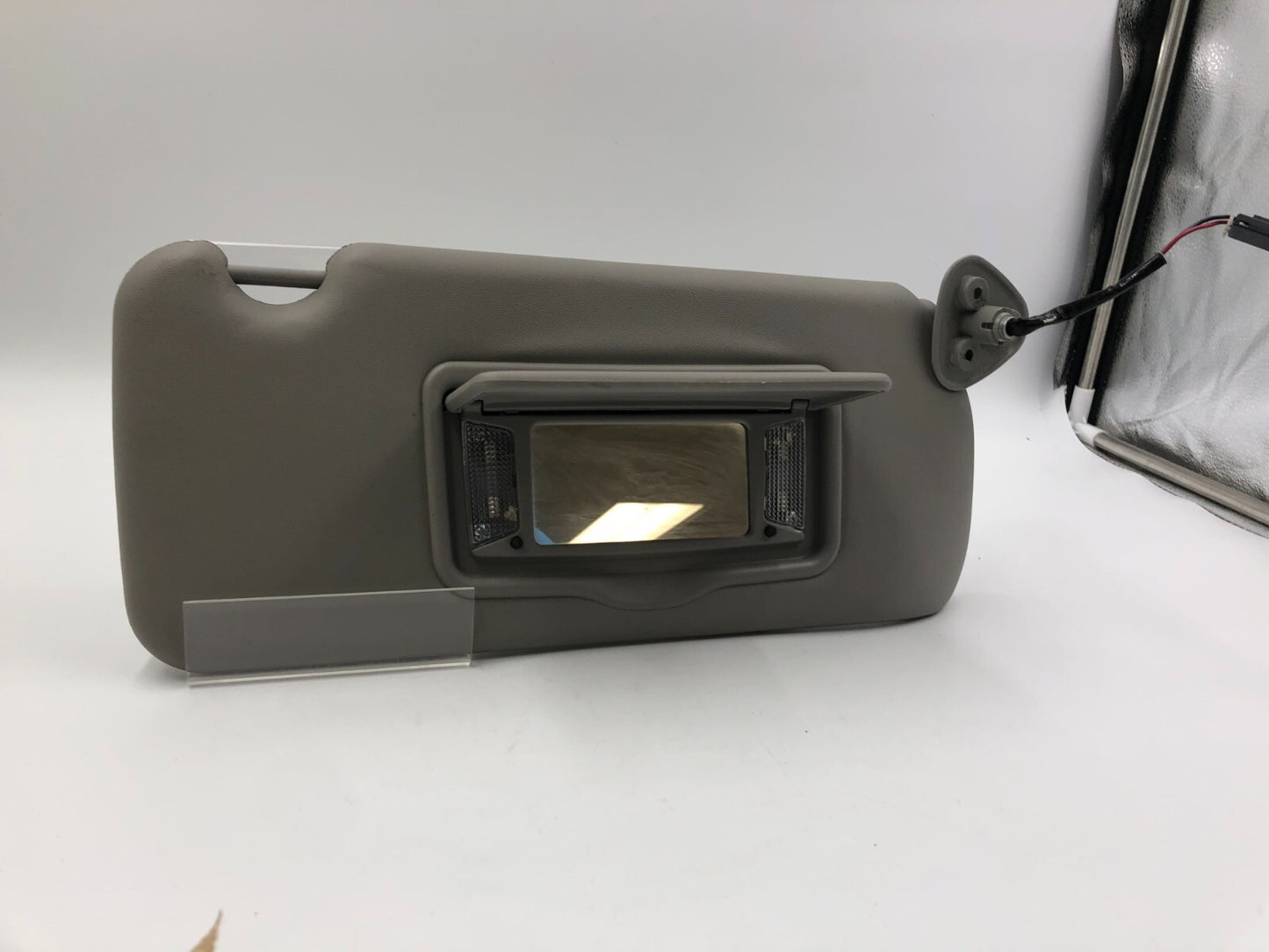 2003-2007 Cadillac CTS Passenger Sun Visor Gray Illuminated OEM C04B66003