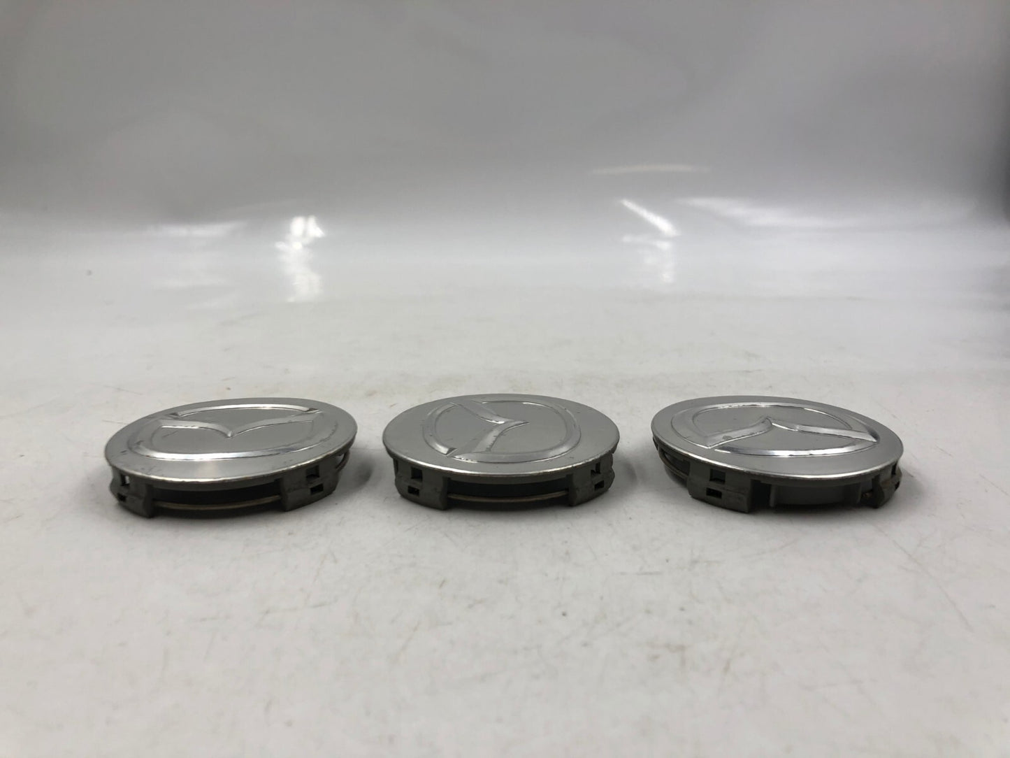 Mazda Rim Wheel Center Cap Set Silver OEM B01B34064