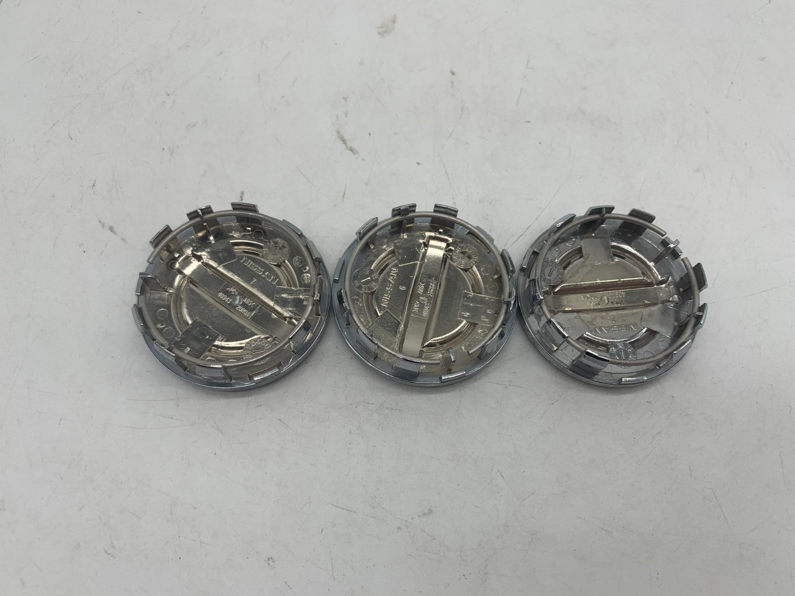 Nissan Rim Wheel Center Cap Chrome 2-inch OEM 40343-2DR0A