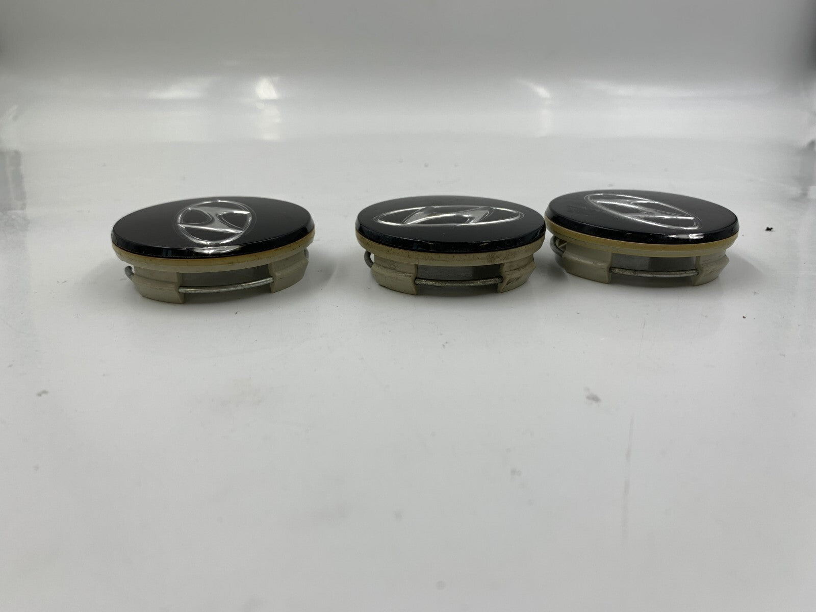 Hyundai Wheel Center Cap Set of 3 Black 2-1/4 inch OEM B01B05018