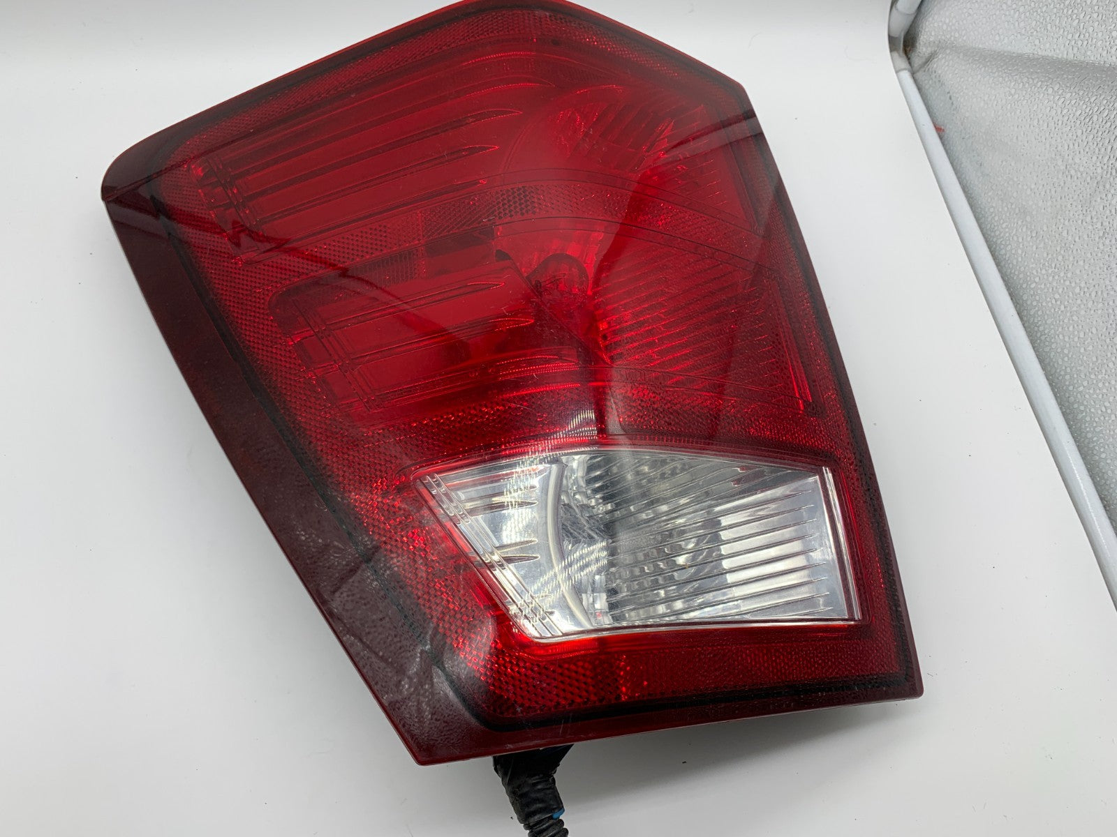 2007-2010 Jeep Grand Cherokee Driver Side Tail Light Taillight OEM C02B21001