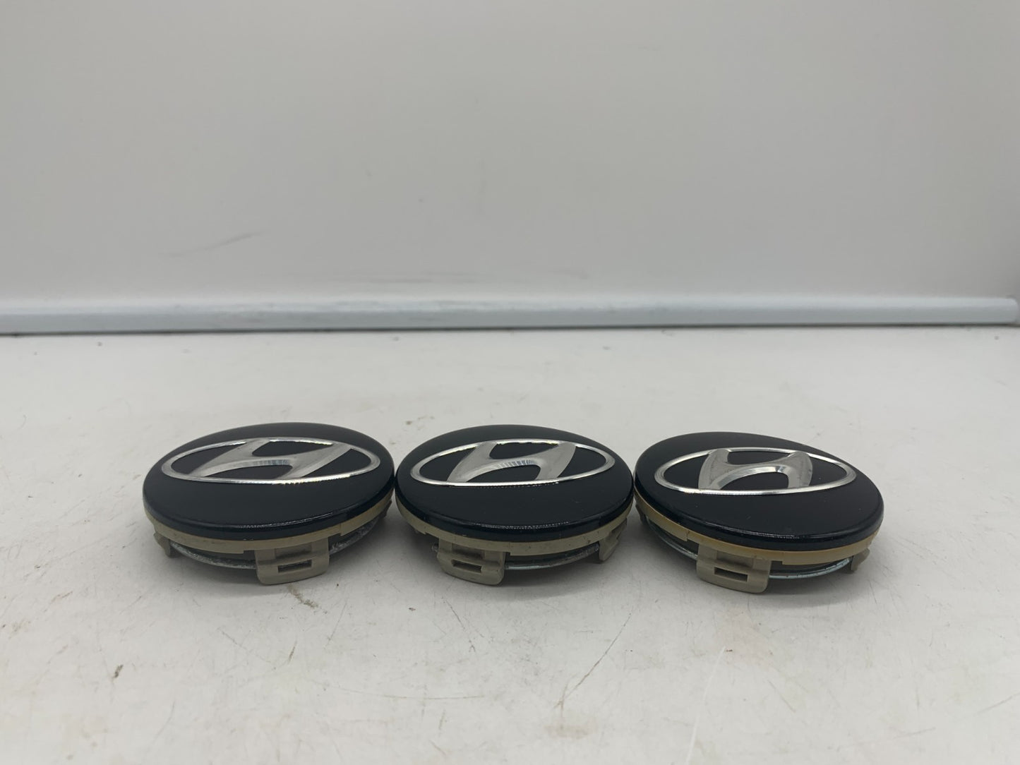 Hyundai Wheel Center Cap Set of 3 Black 2-1/4 inch OEM 52960-3K210
