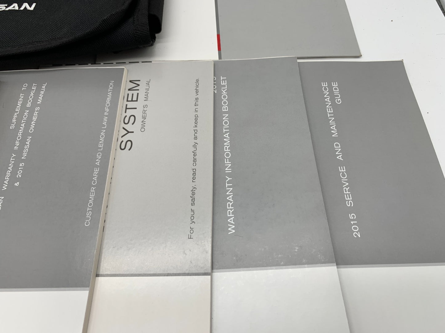 2015 Nissan Rogue Owners Manual Set with Case OEM D03B05023