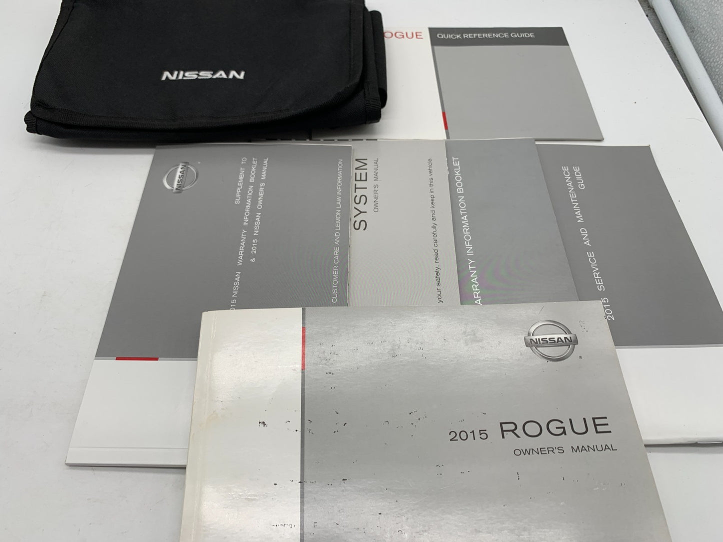 2015 Nissan Rogue Owners Manual Set with Case OEM D03B05023