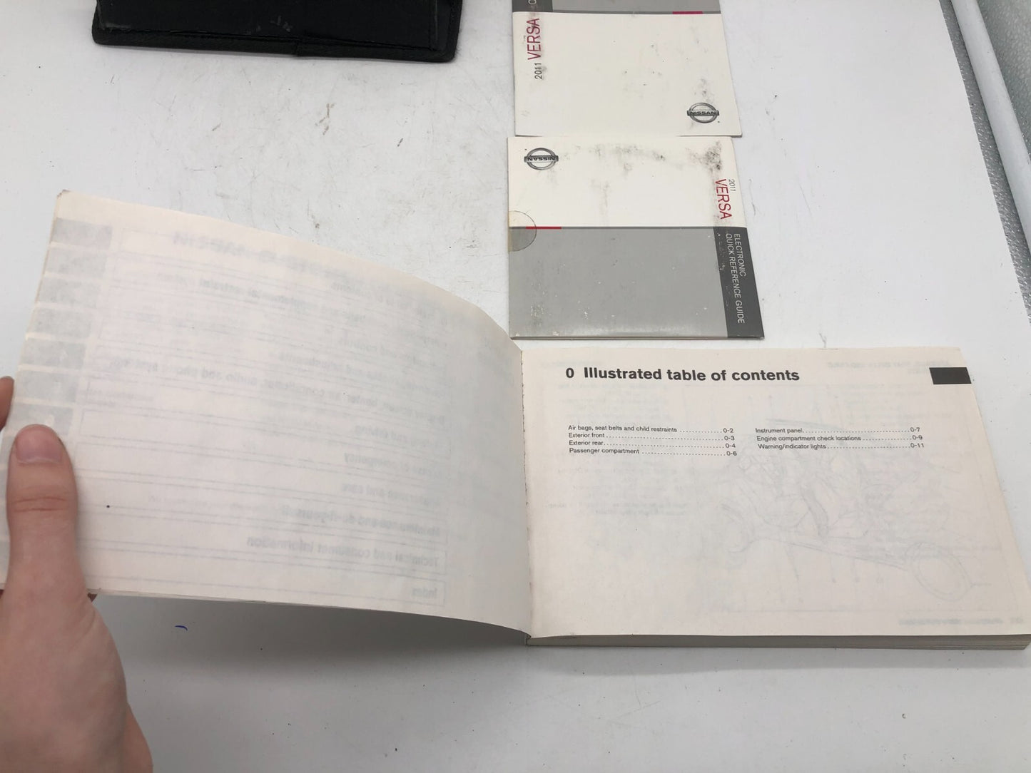2011 Nissan Versa Owners Manual Set with Case OEM E02B40062