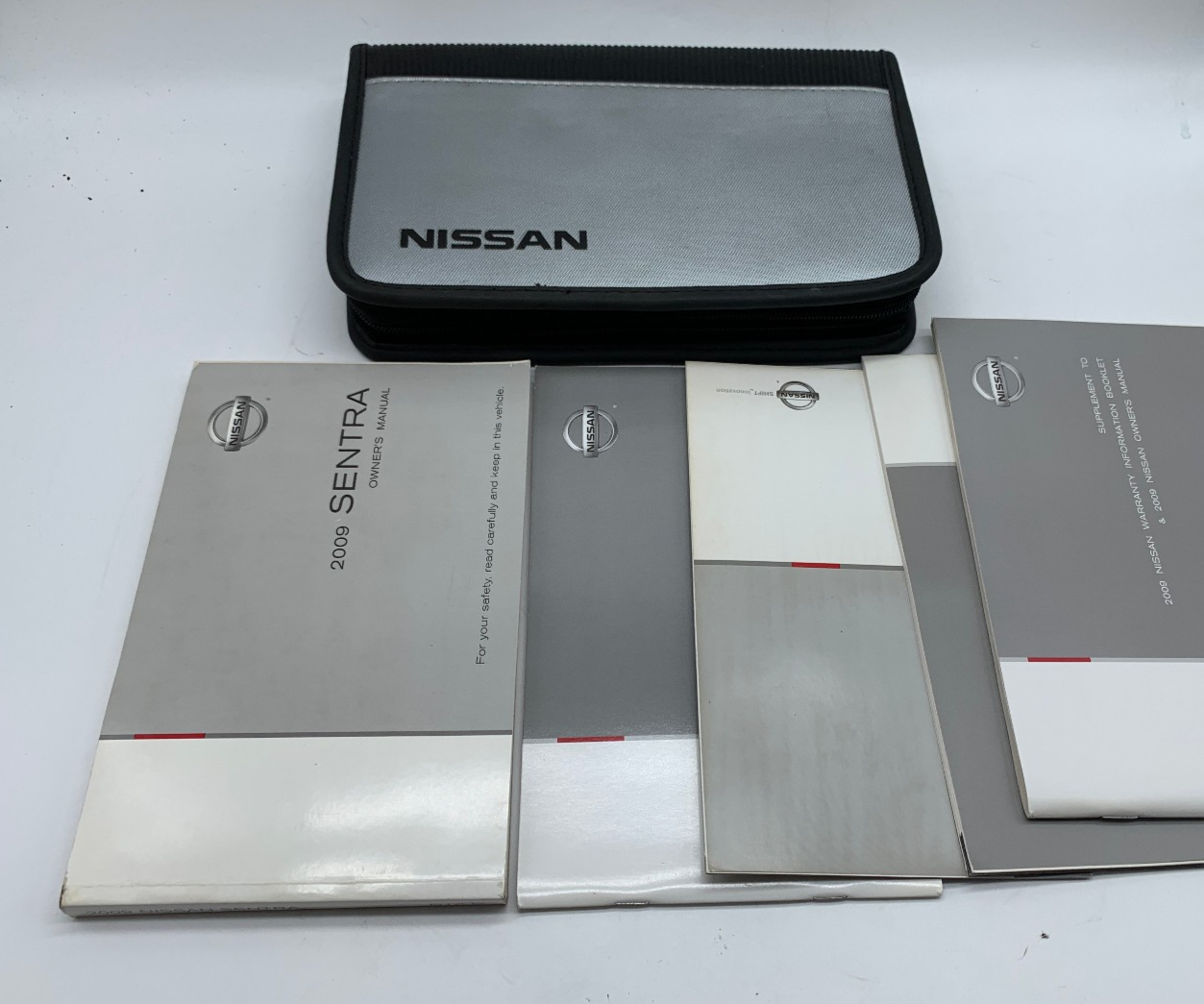 2009 Nissan Sentra Owners Manual Set with Case OEM D03B14041