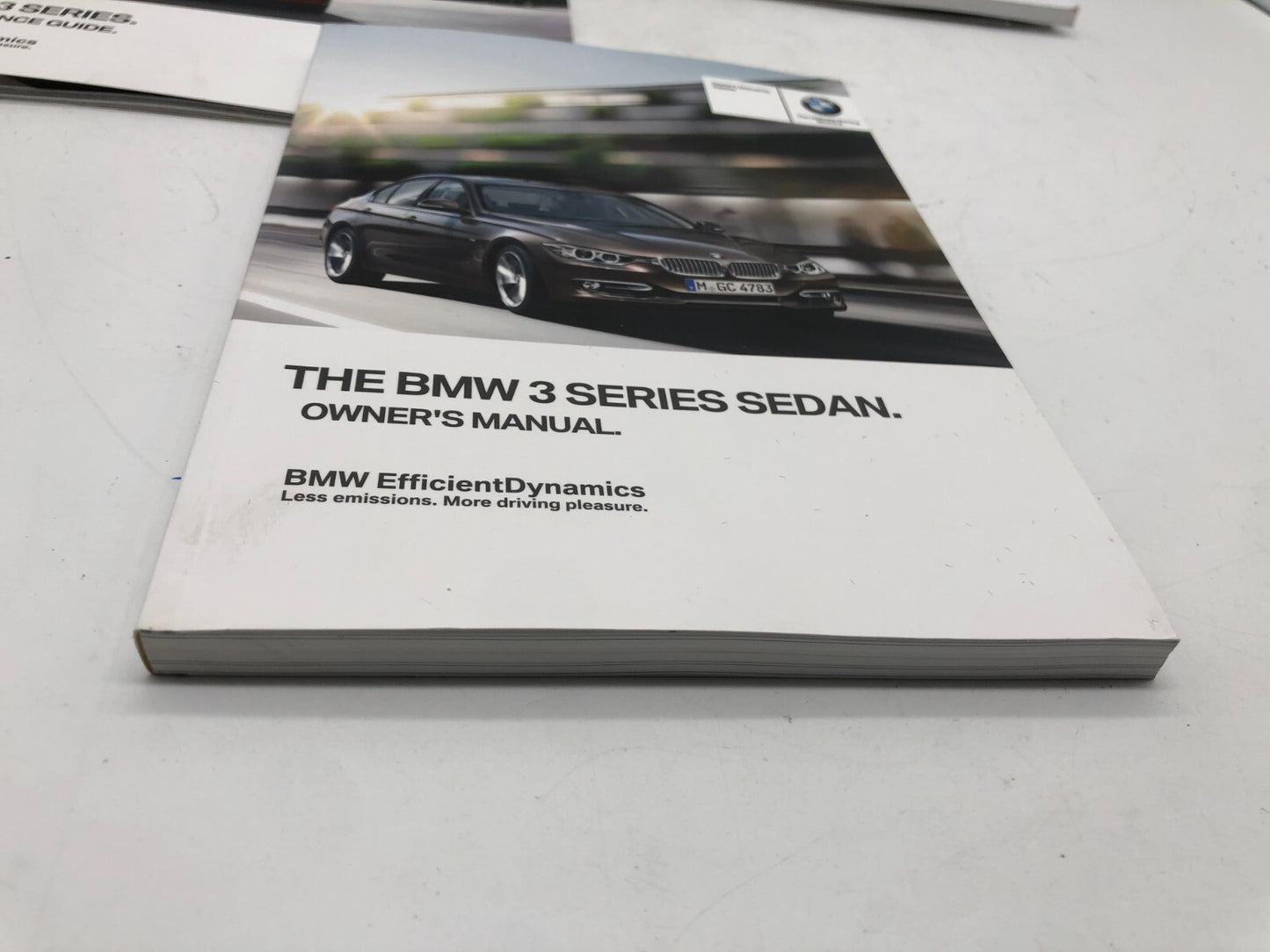 2012 BMW 3 Series Owners Manual Set with Case OEM E02B40066