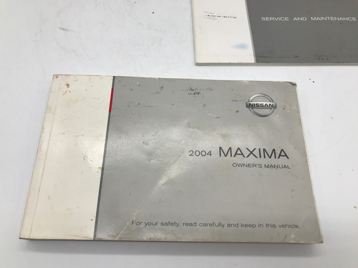 2004 Nissan Maxima Owners Manual Set with Case OEM E02B65003