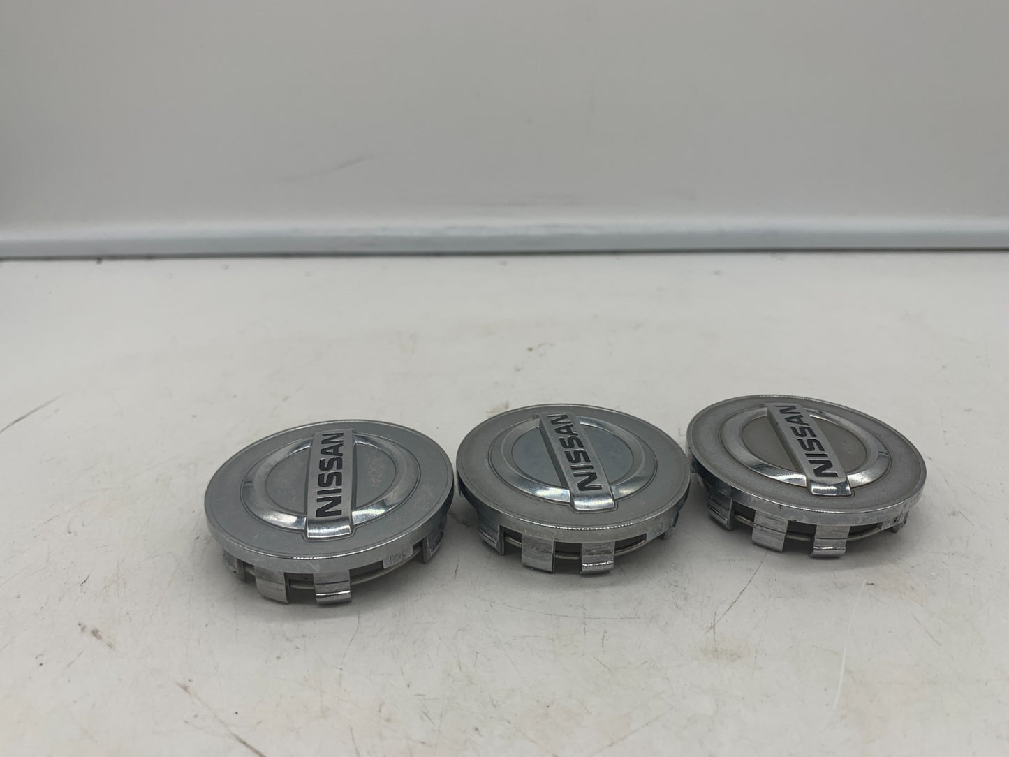 Nissan Rim Wheel Center Cap Chrome 2-inch OEM 40343-2DR0A