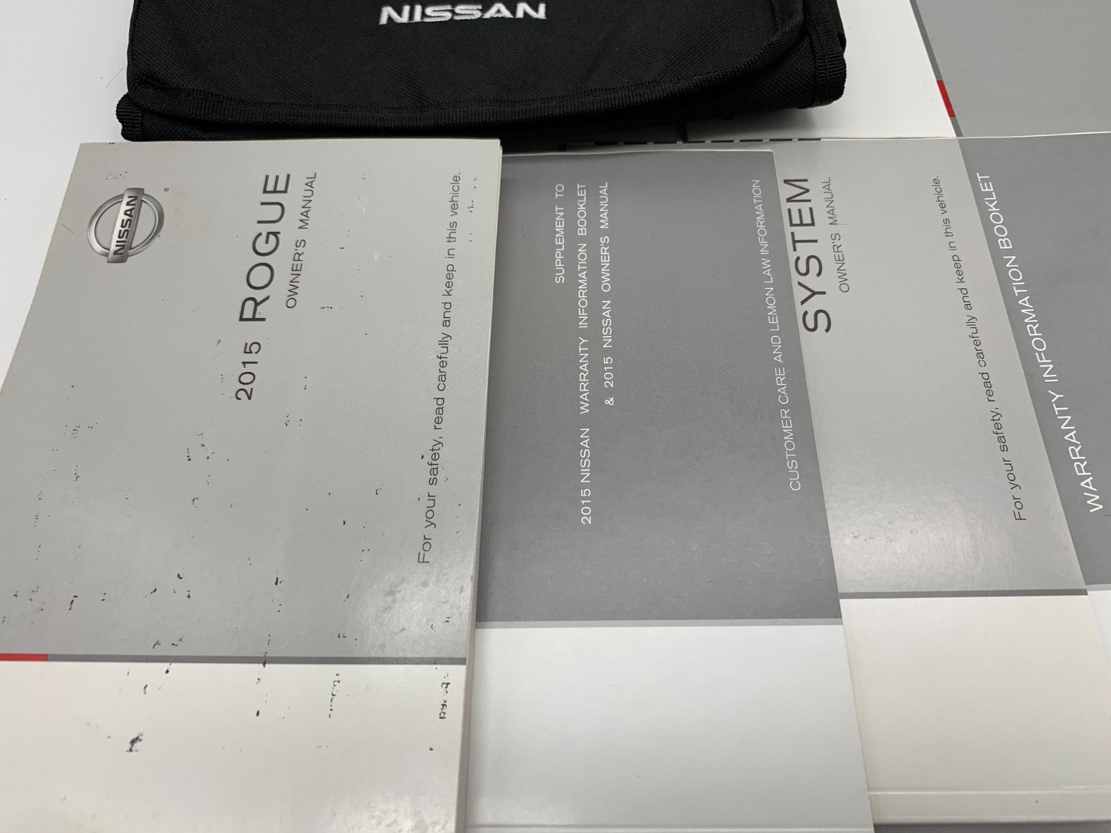 2015 Nissan Rogue Owners Manual Set with Case OEM D03B05023