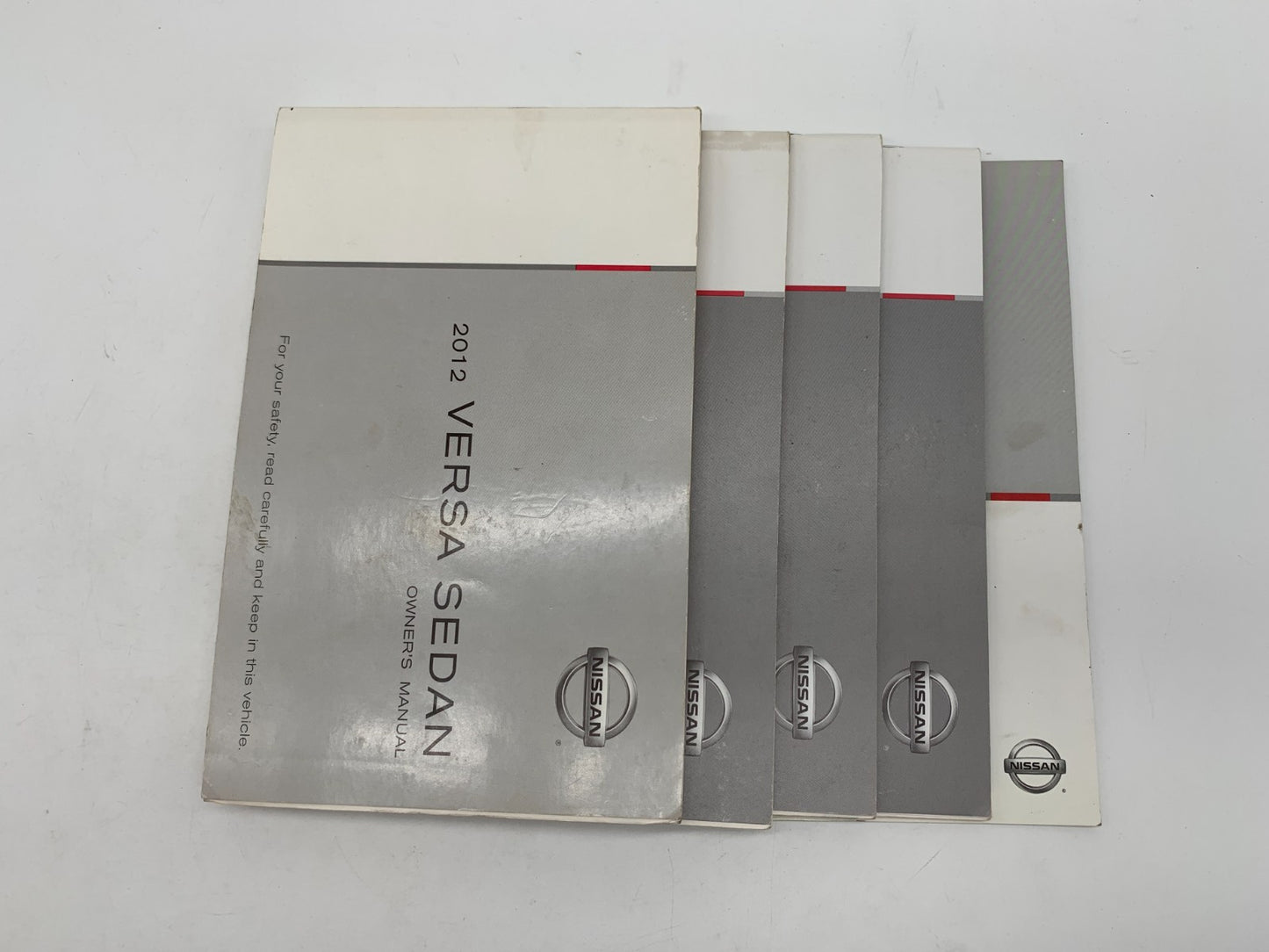 2012 Nissan Versa Owners Manual Set OEM D01B66017