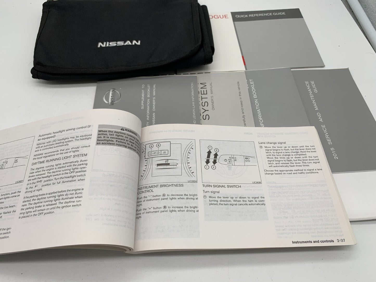 2015 Nissan Rogue Owners Manual Set with Case OEM D03B05023