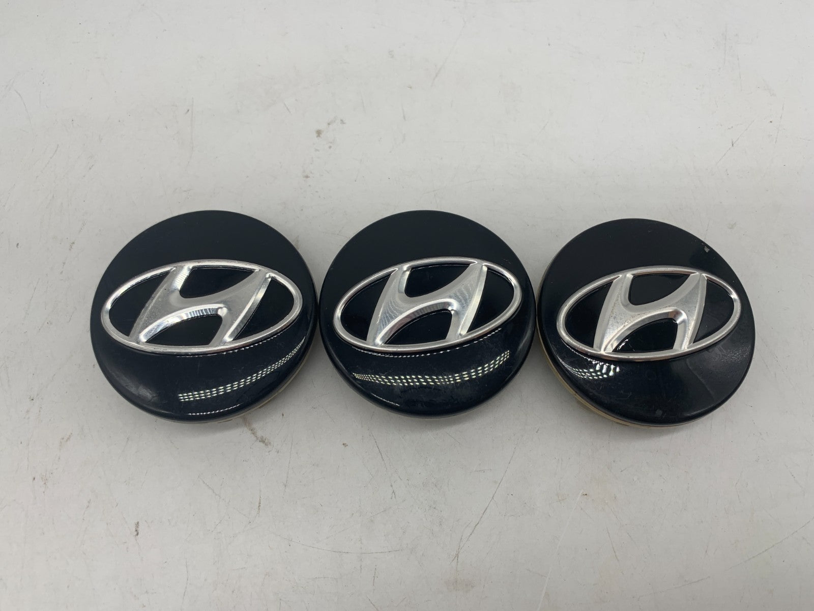 Hyundai Wheel Center Cap Set of 3 Black 2-1/4 inch OEM 52960-3K210