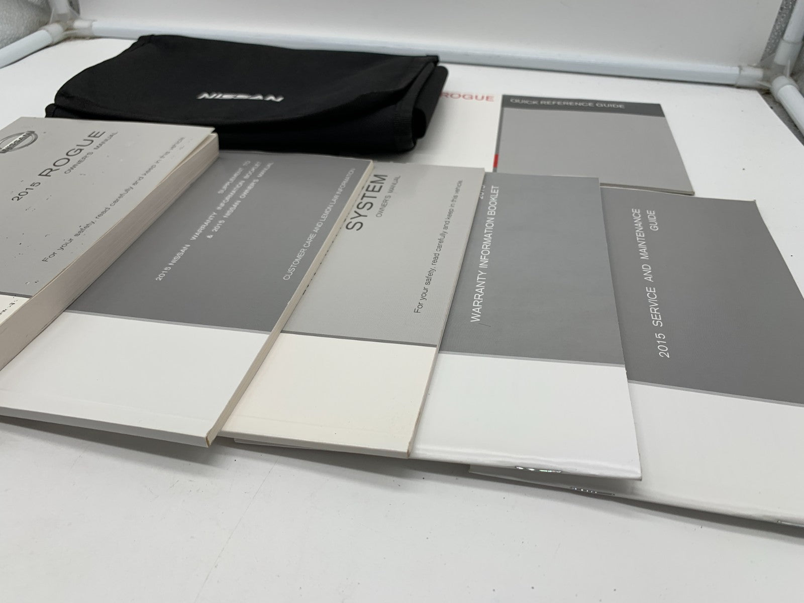 2015 Nissan Rogue Owners Manual Set with Case OEM D03B05023