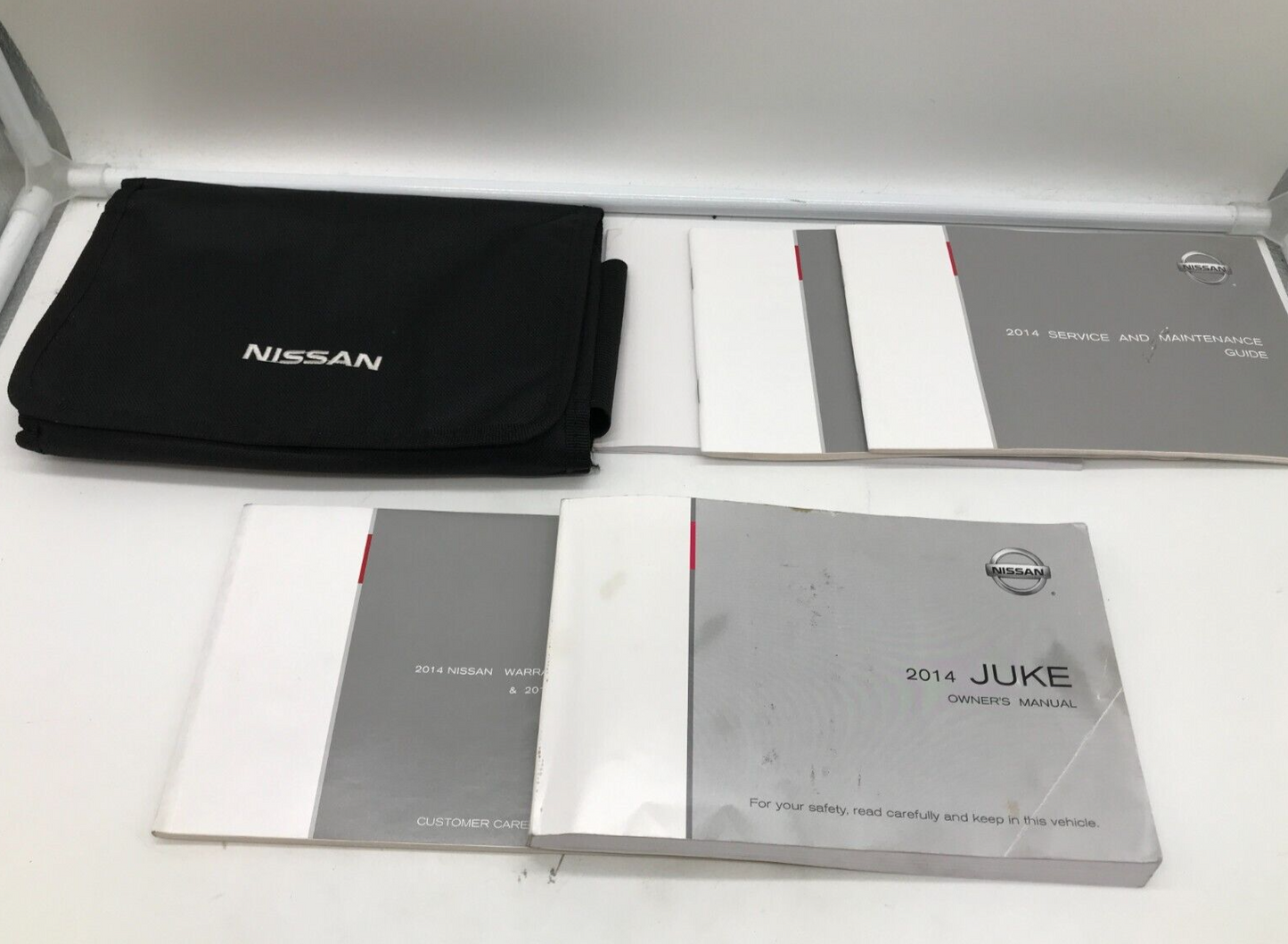 2014 Nissan Juke Owners Manual Set with Case OEM E02B68004