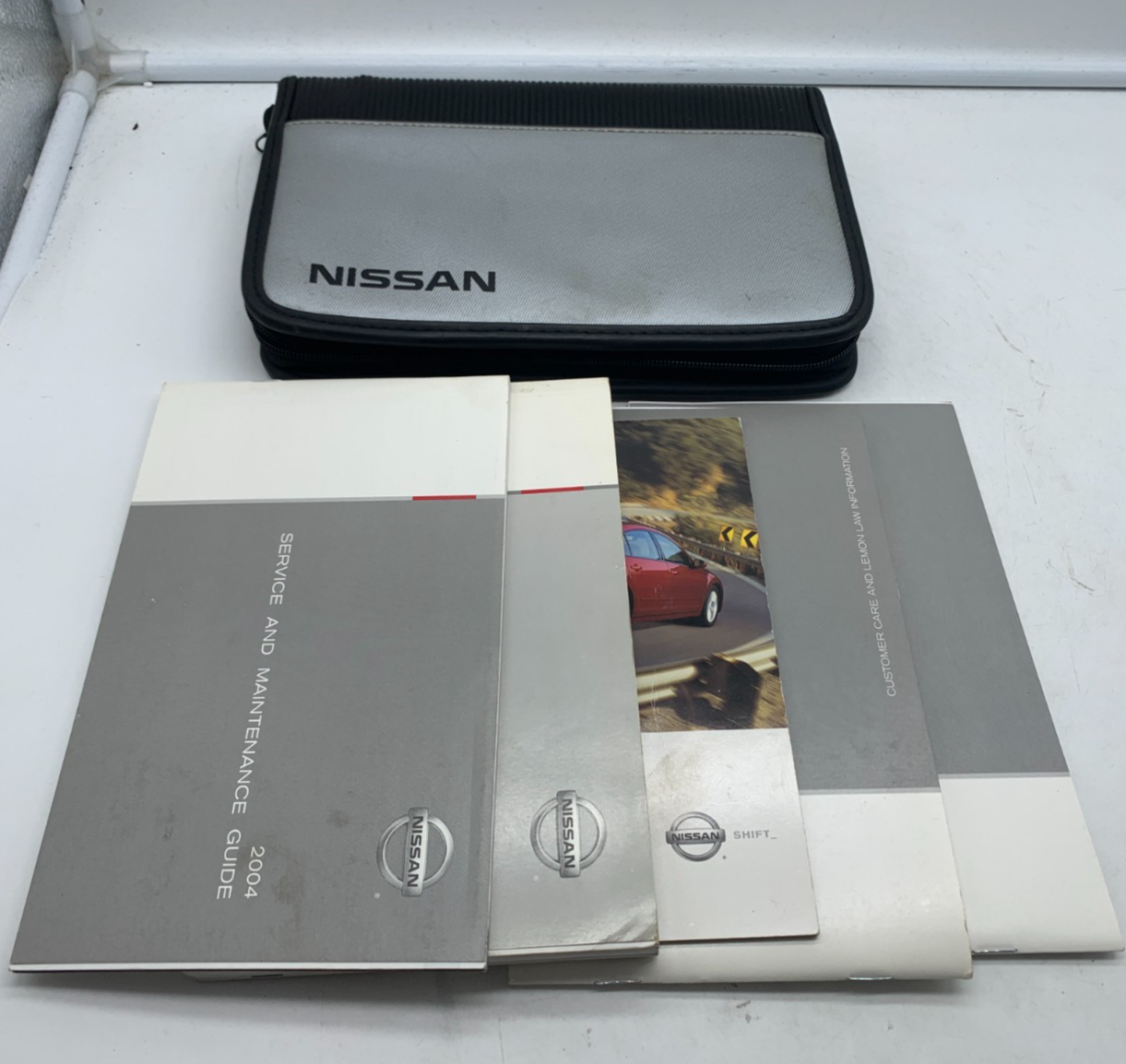 2004 Nissan Maxima Owners Manual Set with Case OEM R01B15012