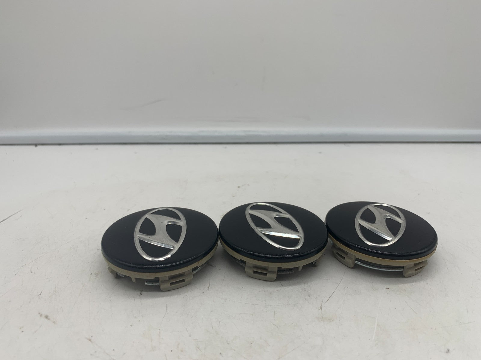 Hyundai Wheel Center Cap Set of 3 Black 2-1/4 inch OEM 52960-3K210